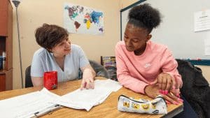 Writing Center Tutor and Student College Help