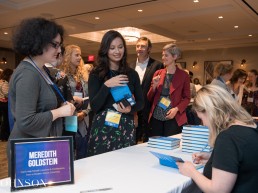 Meredith Goldstein signing books for student