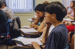 teens in print student in class
