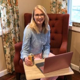 scarlett on the computer smiling