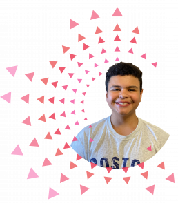 Graphic: photo of smiling student with pink and red triangles in a sunburst pattern
