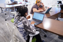 student working on laptop